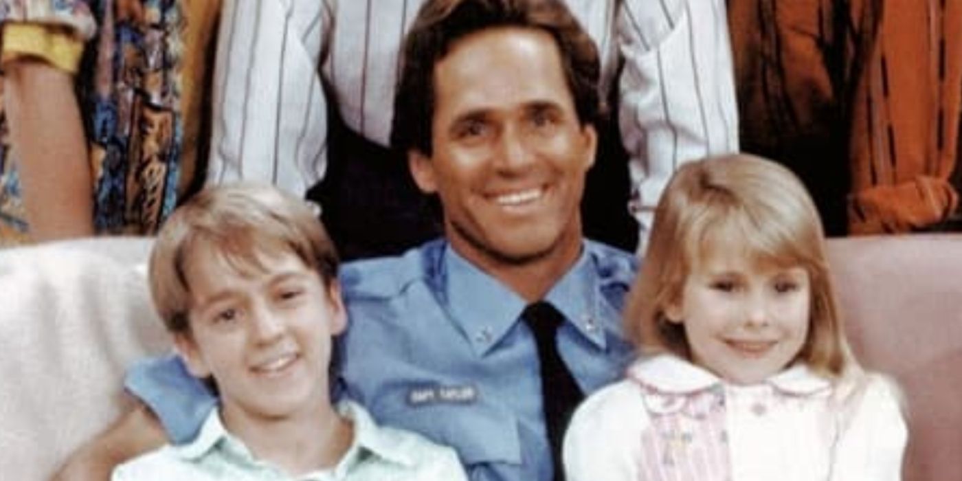 Cropped Photo of Gregory Harrison and two kids on a couch in The Family Man