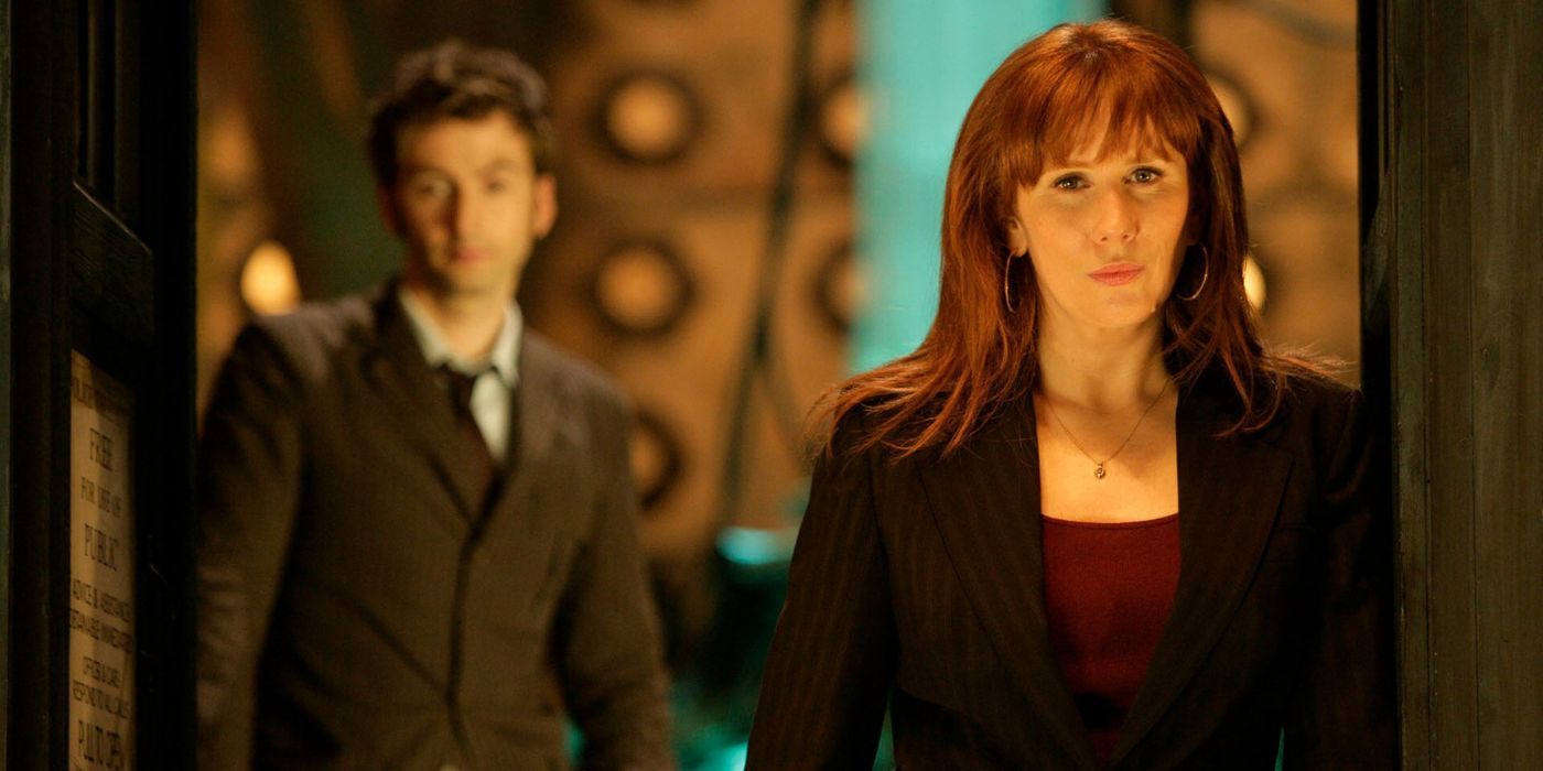 Doctor Who's Donna Noble stares blankly in the foreground with the Tenth Doctor in the background