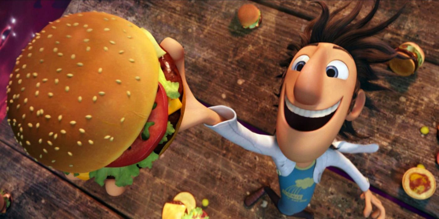Flint Lockwood holding up a cheeseburger triumphantly from Cloudy with a Chance of Meatballs