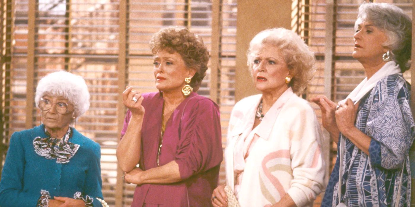 Golden Girls main characters stand next to each other in front of a window