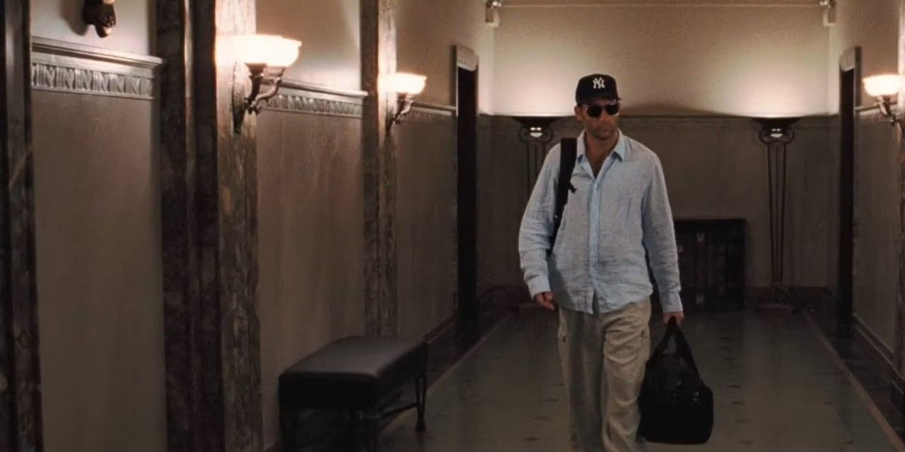 Dalton walking in a hallway in Inside Man