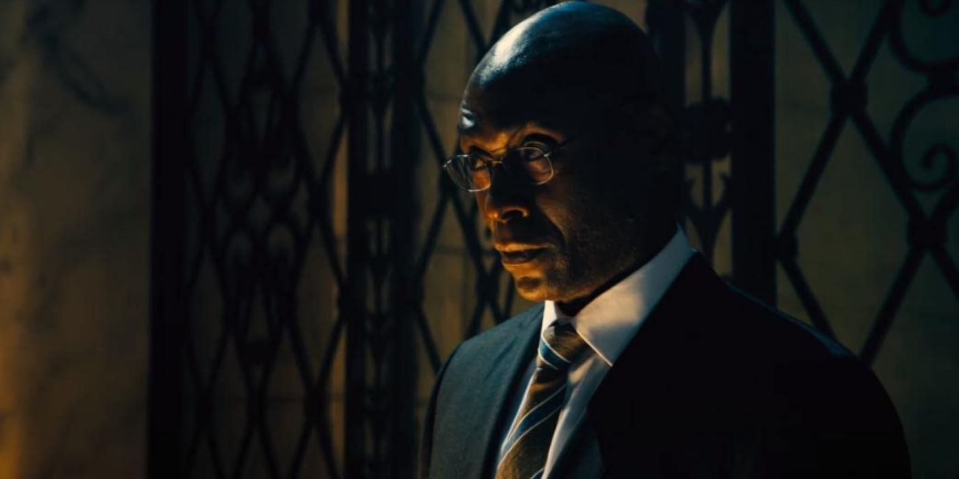 Lance Reddick at his desk as Charon in John Wick: Chapter 4