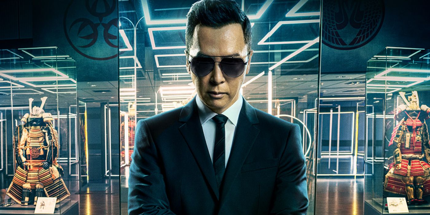 Donnie Yen as Caine surreounded by samurai suits in glass cases in John Wick: Chapter 4