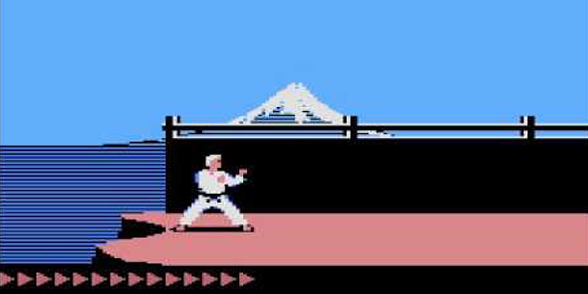 The hero stands on the mountain in Karateka.
