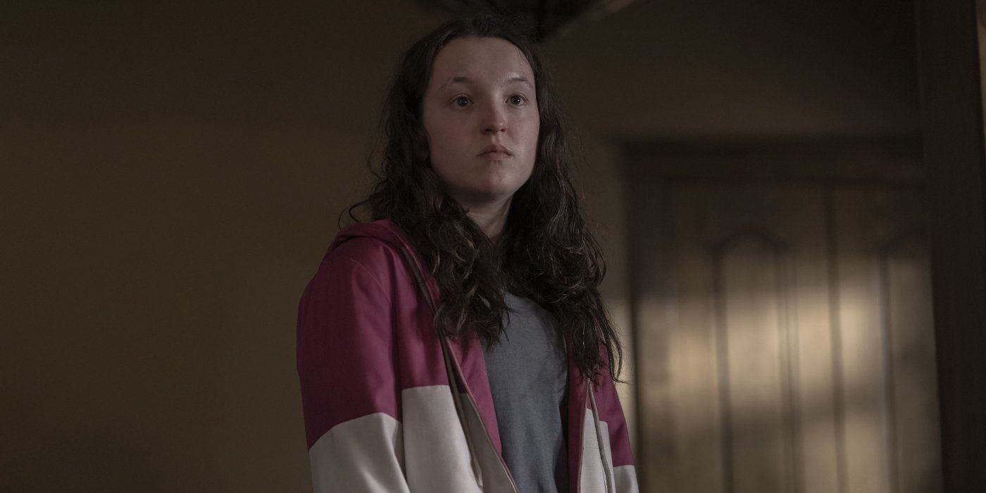 Ellie, played by Bella Ramsay, in a hoodie jacket with their hair down in "Kin" from The Last Of Us