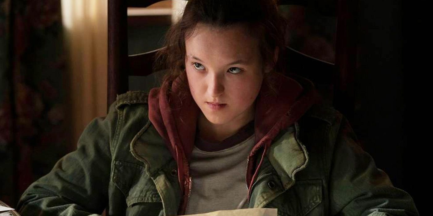 Bella Ramsey as Ellie, reading a piece of paper in The Last of Us.