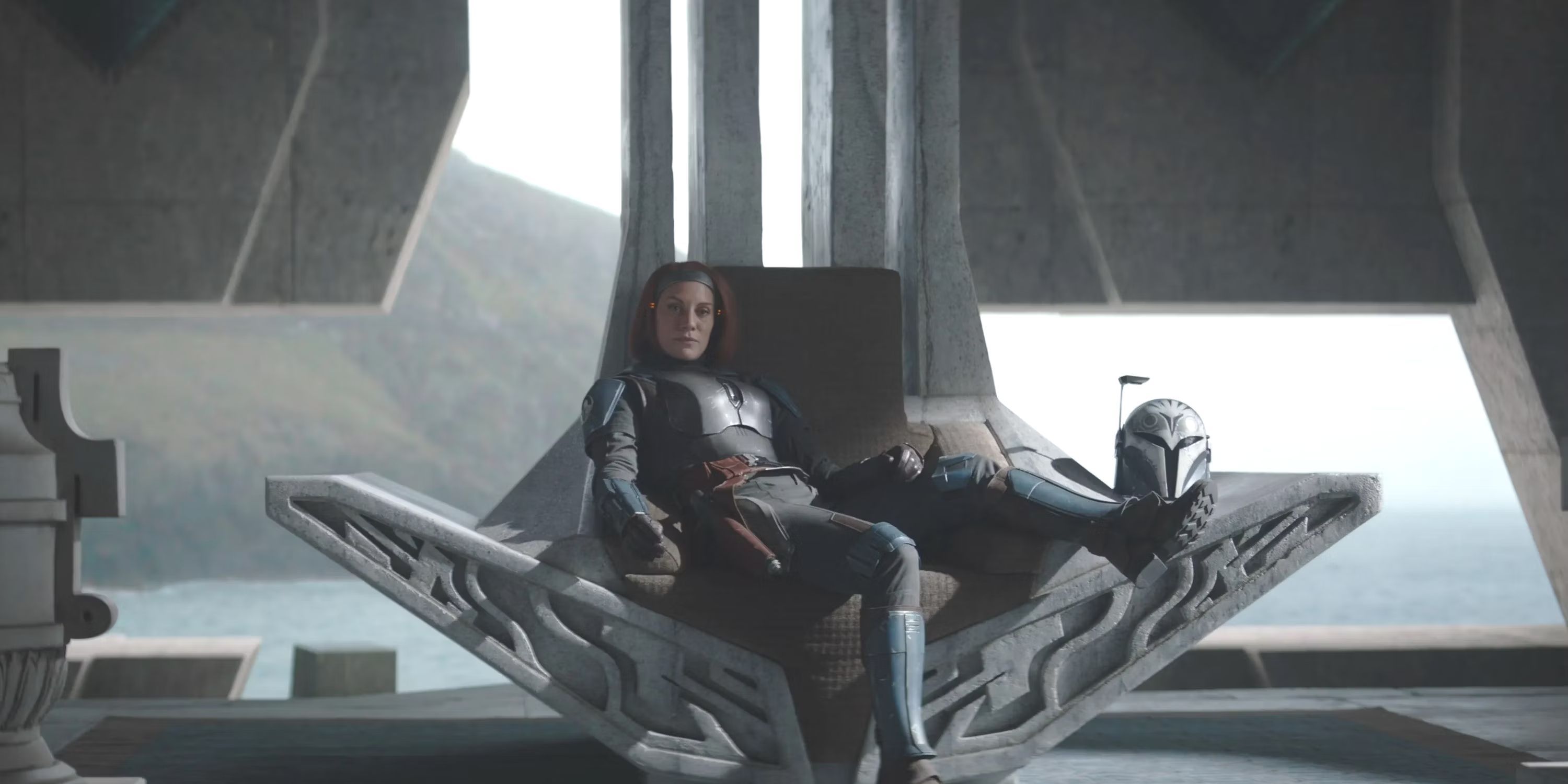 Mandalorian Bo-Katan sits on her throne in throne room