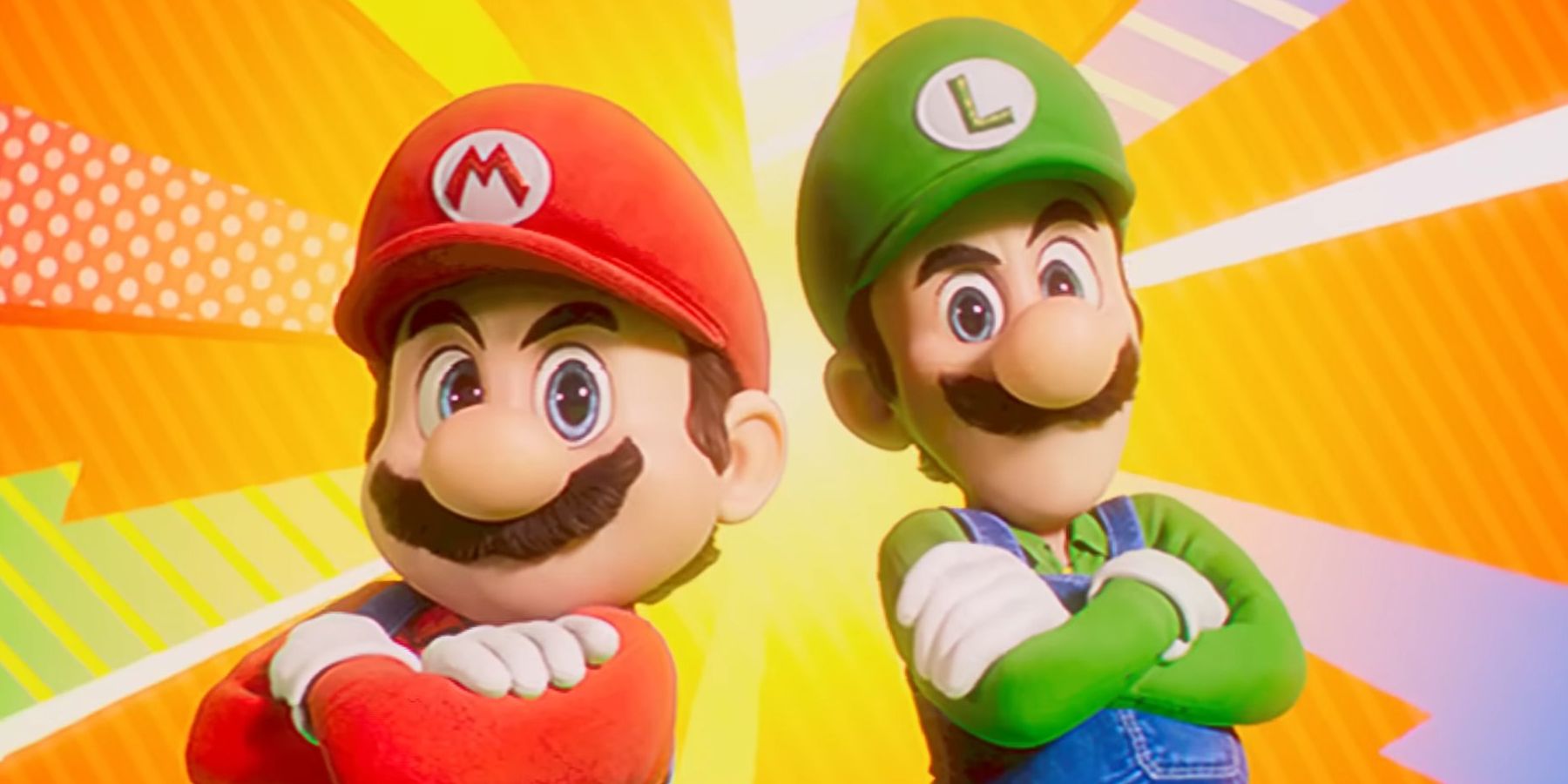 Mario e Luigi de costas um para o outro em um anúncio do filme Super Mario Bros.