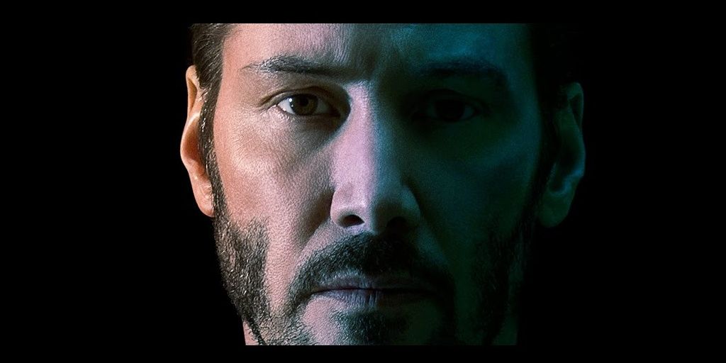A close-up image of Keanu Reeves as the titular character in John WIck