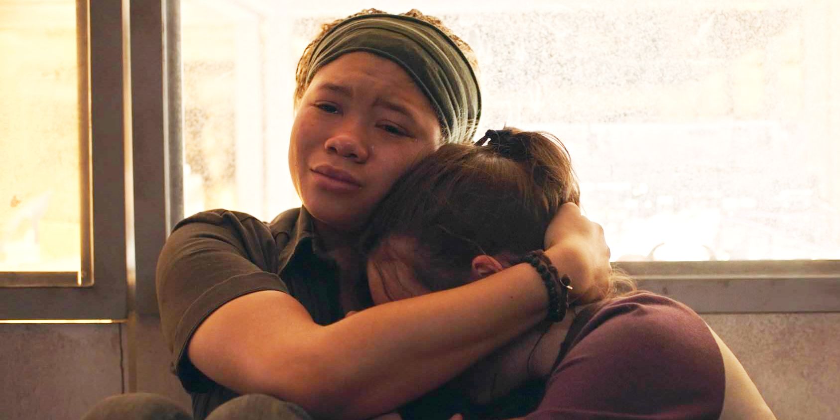 Riley holds Ellie in The Last of Us HBO episode Left Behind