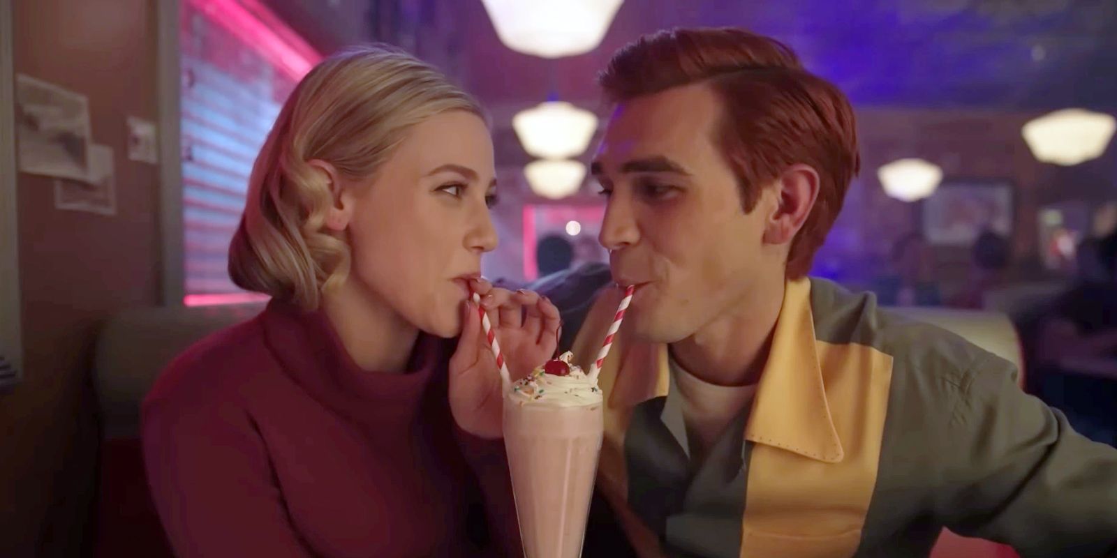 Archie and Betty share a milkshake together at Pop's in Riverdale