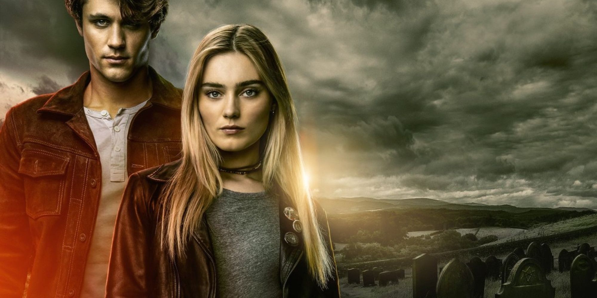 Meg Donnelly's Mary Campbell and Drake Rodger's John Winchester stand together in image from The Winchesters