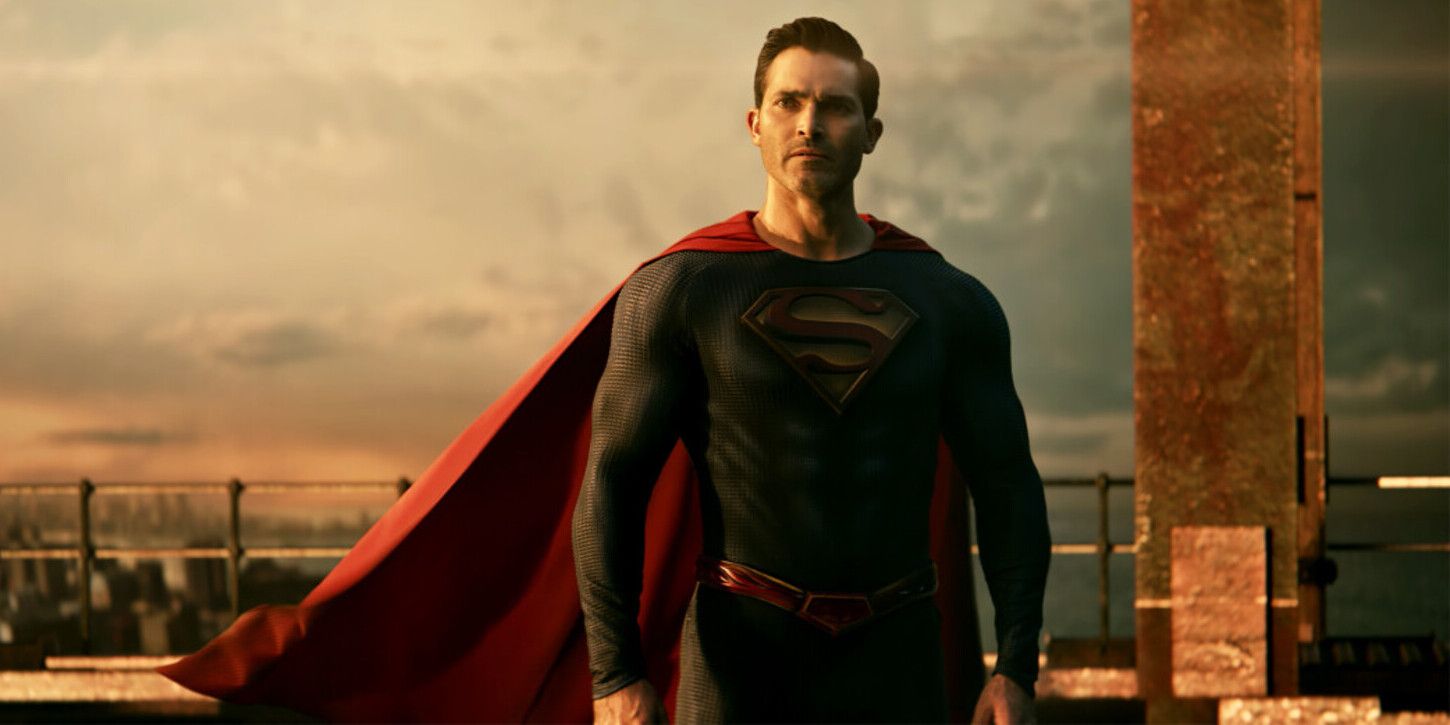 Tyler Hoechlin's Superman stands on a roof at sunset 