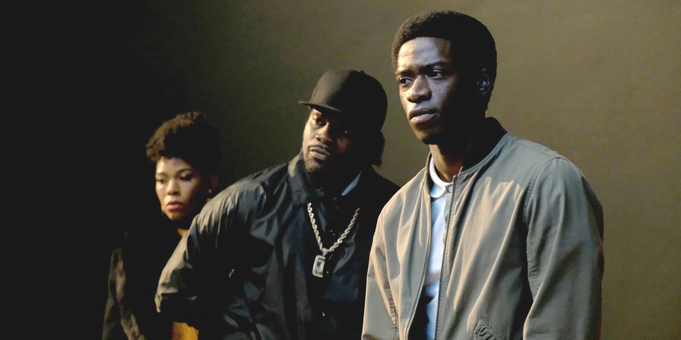 Louie (played by Angela Lewis) and Franklin (played by Damson Idris) stand with Jerome (Amin Joseph) between them.