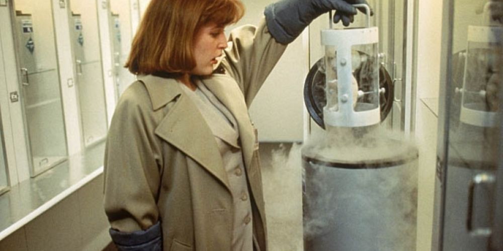 Scully examines an experiment in The X-Files