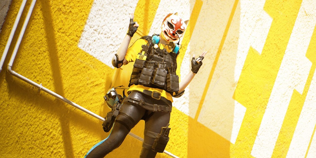 Art for The Finals featuring a persona in  a bulletproof vest in a white and red mask standing in front of a yellow background