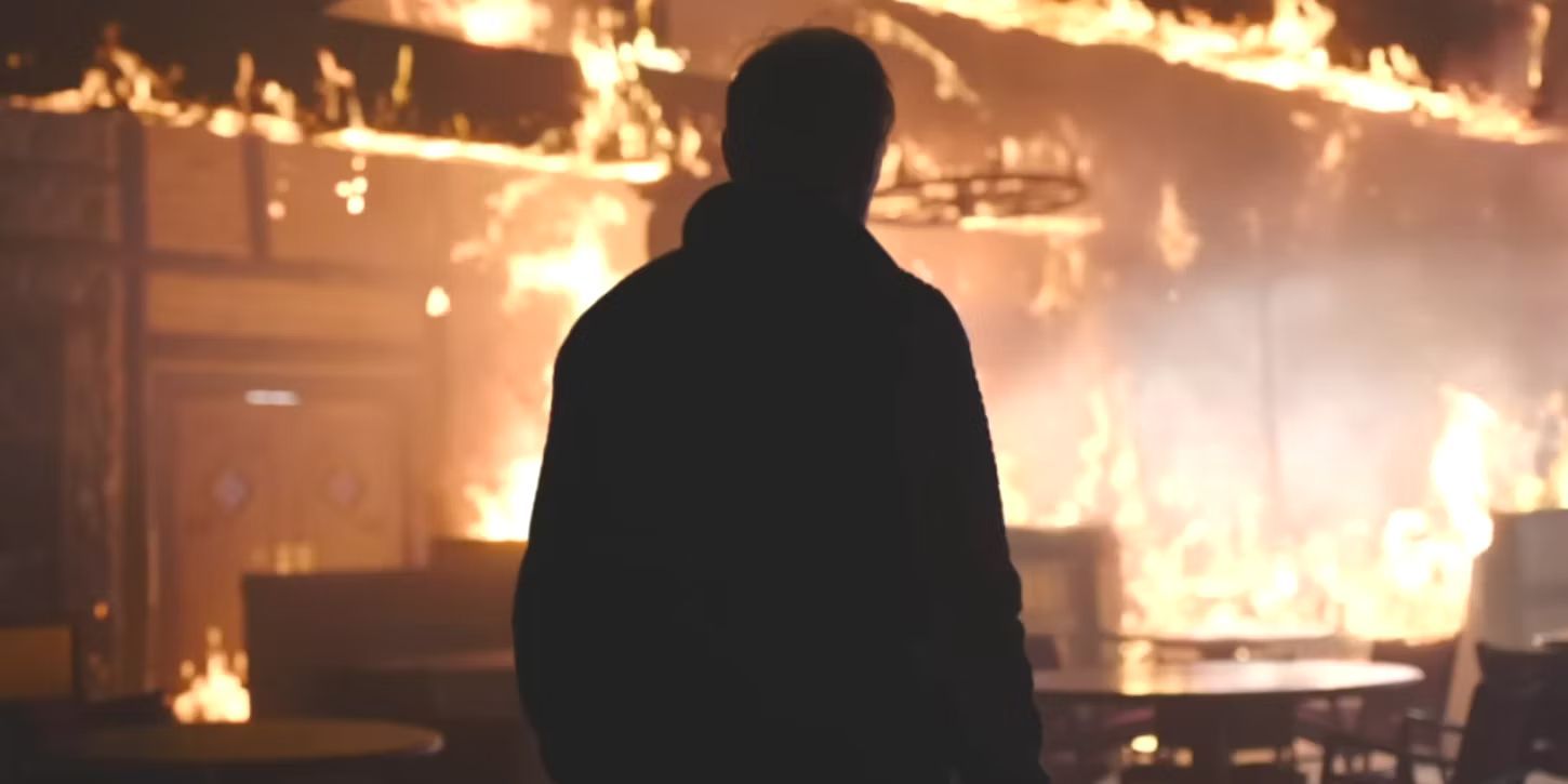 O fogo de The Last of Us queima em torno de uma figura escura