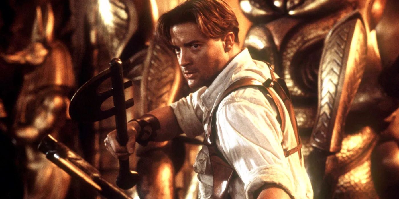 Brendan Frasier as Rick O'Connell wielding an axe in The Mummy movie.