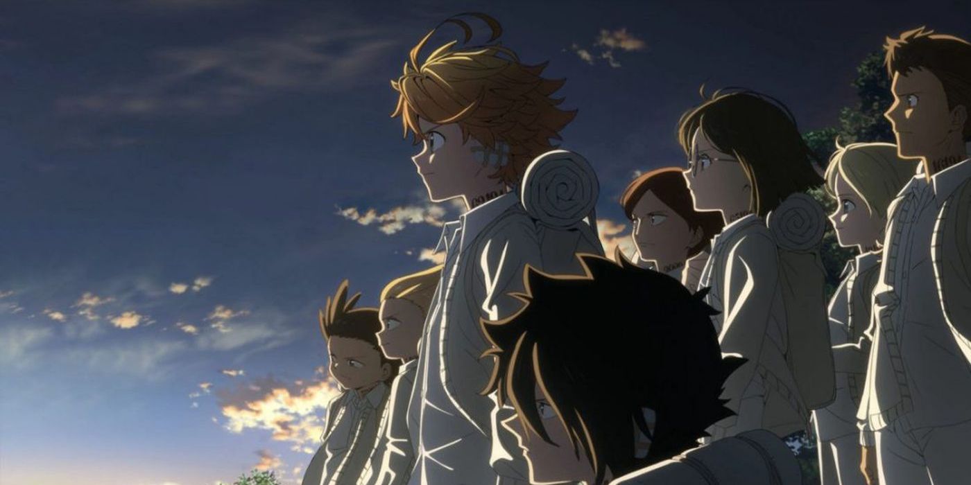 The orphans stand before the sky in The Promised Neverland