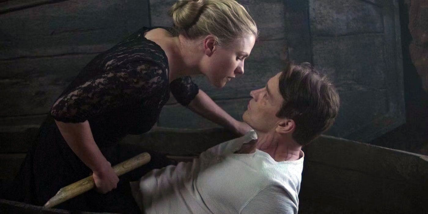 Sookie (played by Anna Paquin) prepares to stake Bill (played by Stephen Moyer) in True Blood.