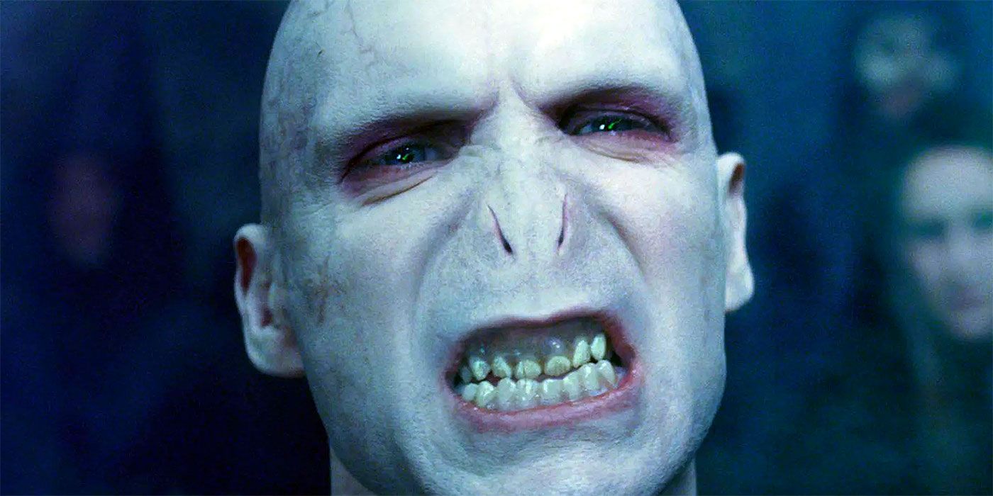 Ralph Fiennes grimacing as Lord Voldemort in Harry Potter.