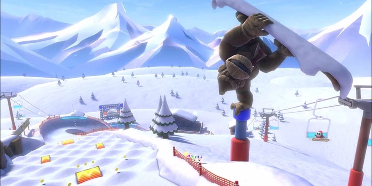 A estátua de Donkey Kong de snowboard paira sobre o Wii DK Summit em Mario Kart 8 Deluxe