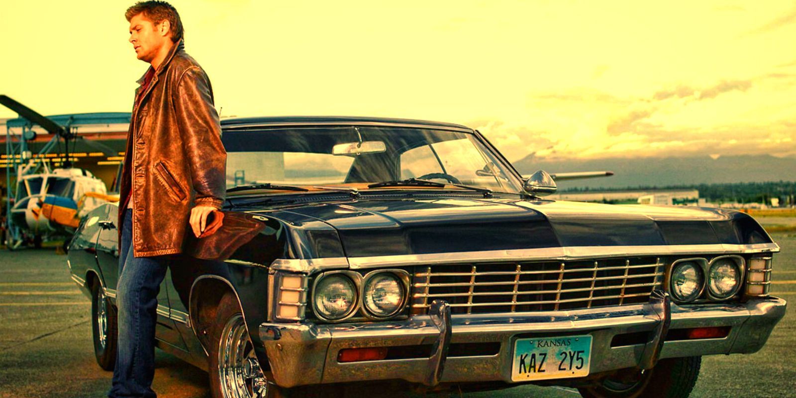 Dean Winchester alongside his Impala, Baby
