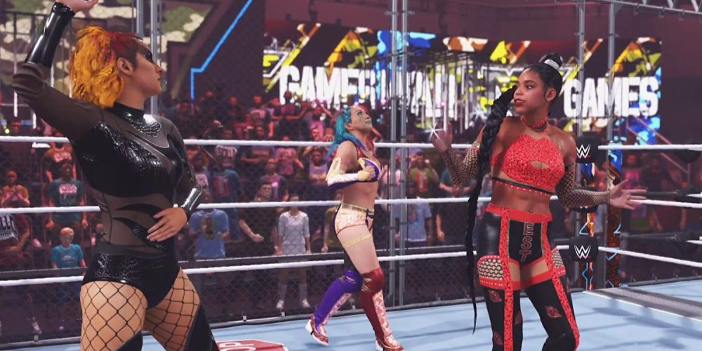 Becky Lynch, Bianca Belair e Asuka na partida WarGames WWE 2K23.