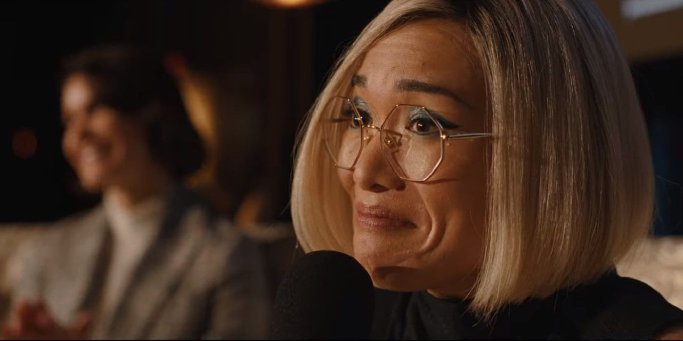 Amy Lau, played by Ali Wong, speaking at a Forster's Conference in Netflix's Beef