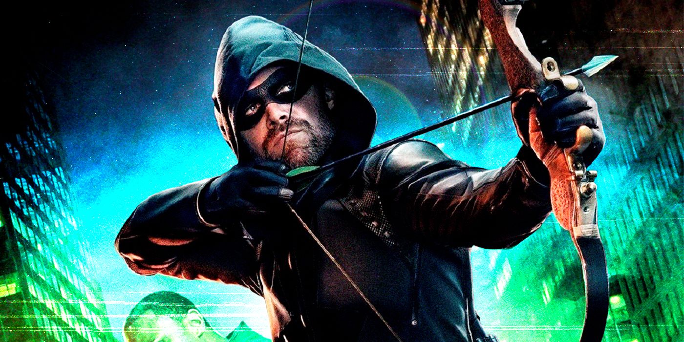 Stephen Amell as Green Arrow with his bow at the ready