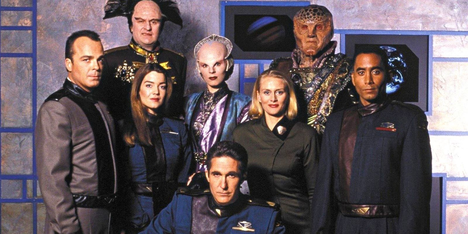 The cast of Babylon 5, aliens and humans alike, posing for a group photo
