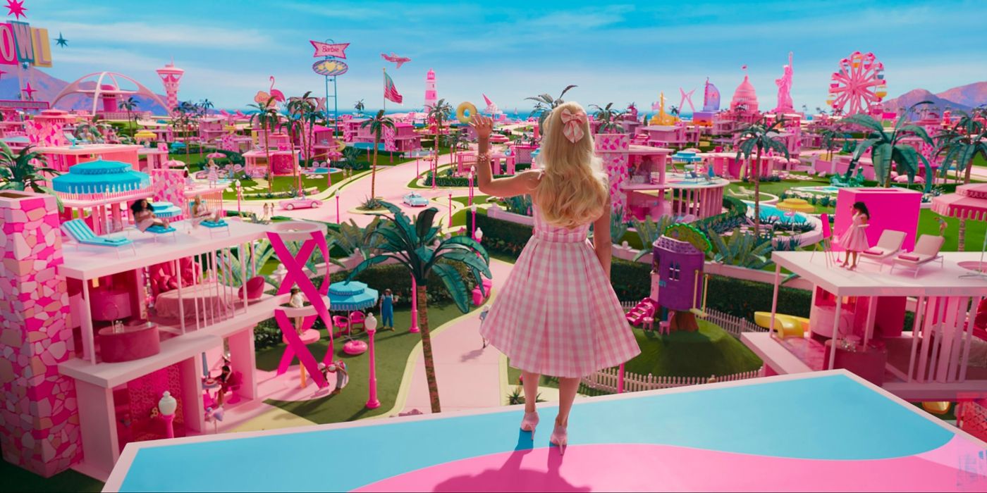 Barbie wears pink gingham dress while waving to the town of Barbieland