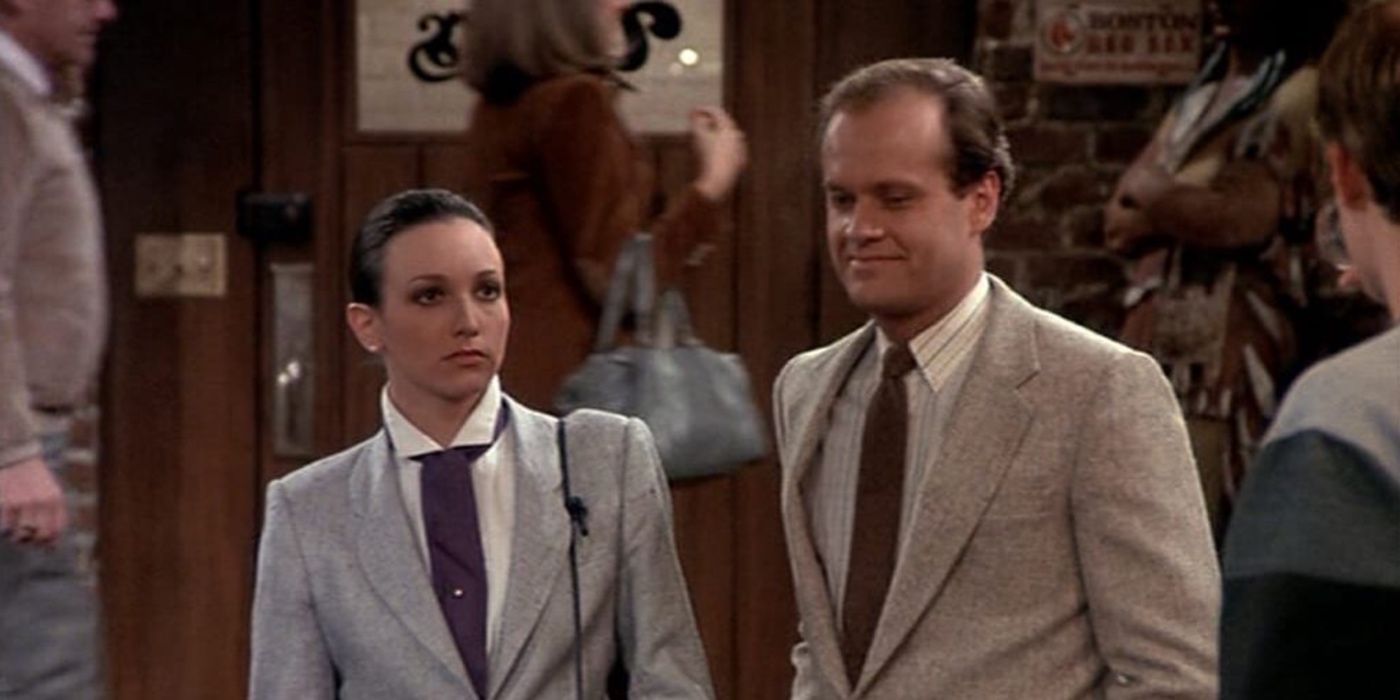 Frasier and Lillith standing next to each other in Cheers