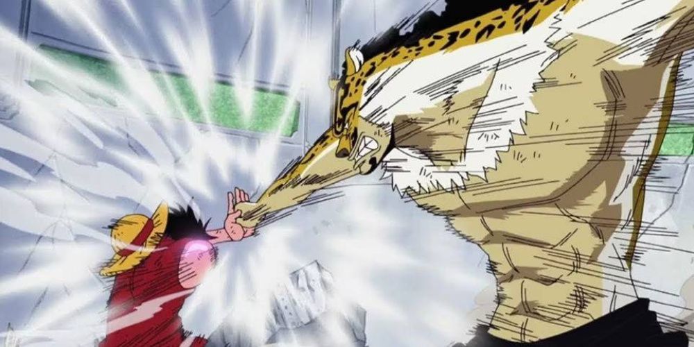 Luffy blocking Rob Lucci's punch with his left hand, sending out a shockwave in One Piece.