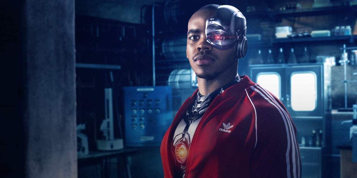 Joivan Wade as Cyborg in HBO Max's Doom Patrol, wearing a red Adidas sweatsuit. 