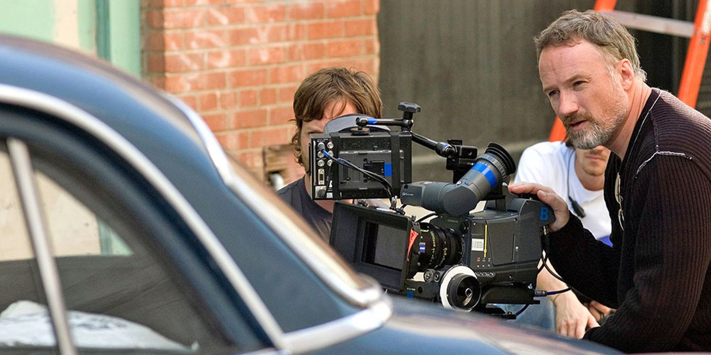 David Fincher composes a shot on set.