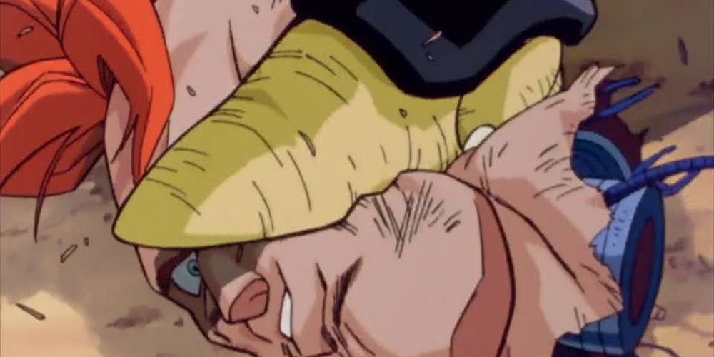 Cell crushes Android 16's head in Dragon Ball Z.