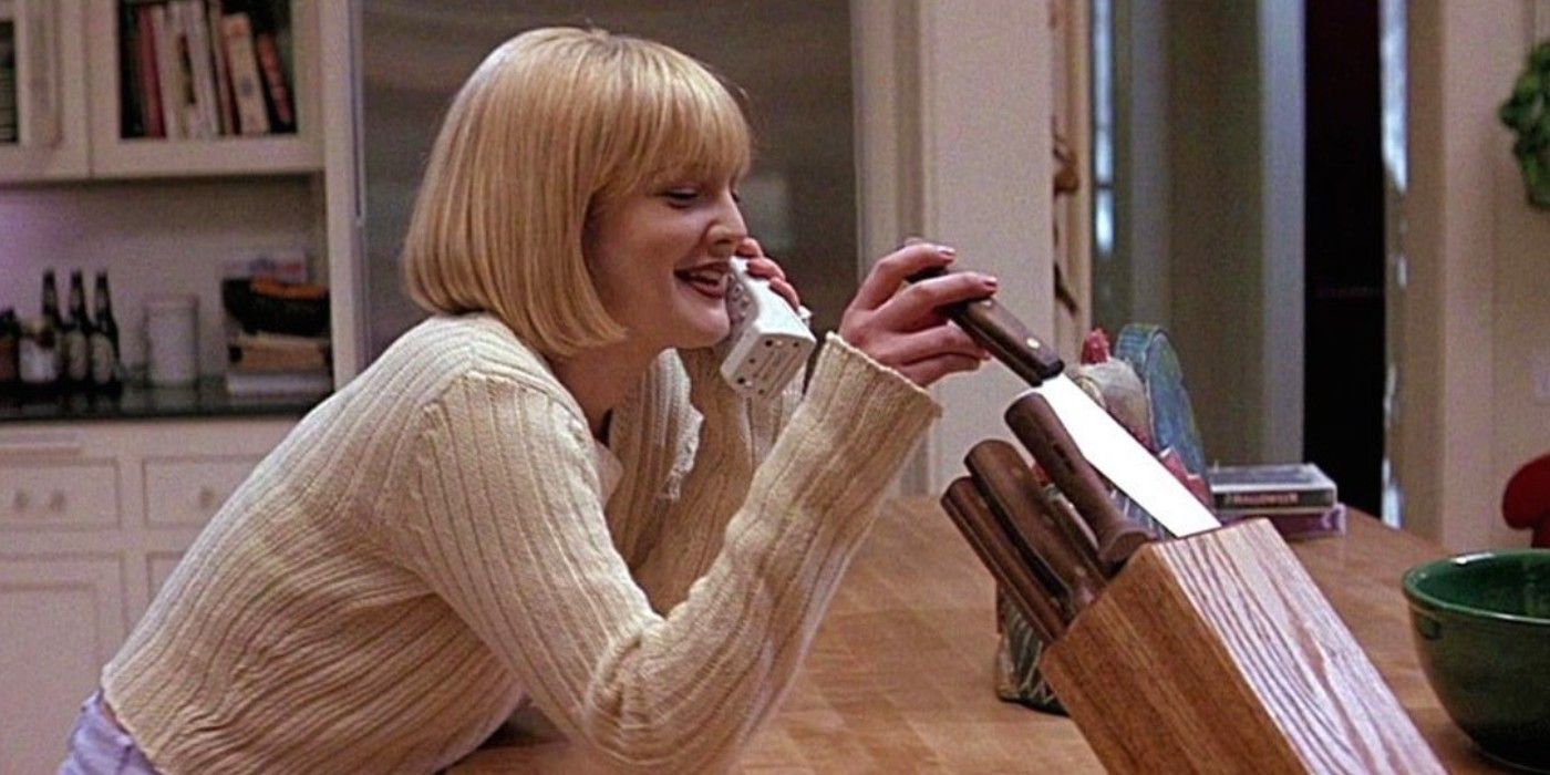 Drew Barrymore as Casey Becker talks to Ghostface on the phone in 1996's Scream. 