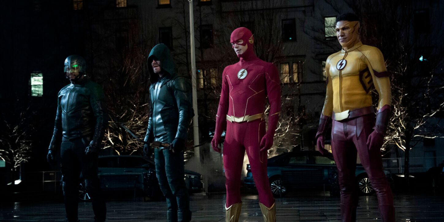 The Flash Diggle, Ollie, Barry, and Wally stand together in costume outside