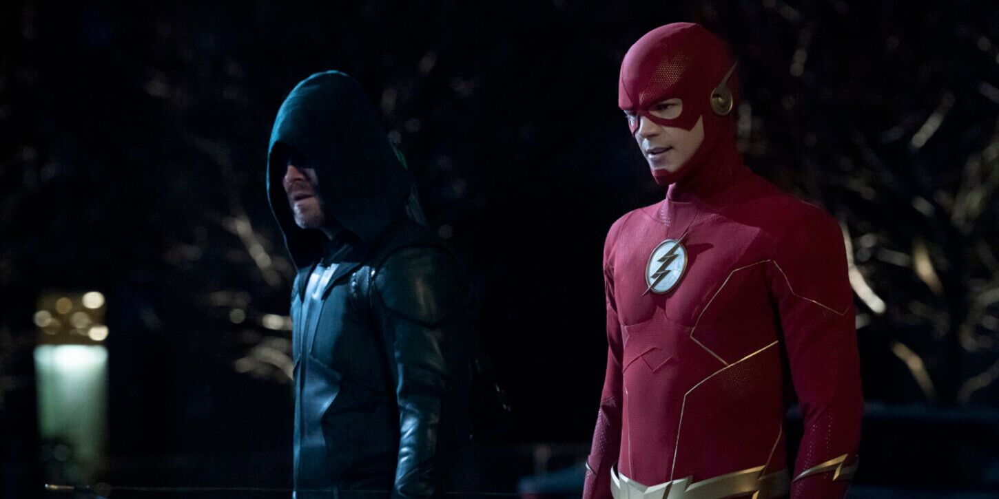 The Flash Oliver (Stephen Amell) stands alongside Barry (Grant Gustin) in costume