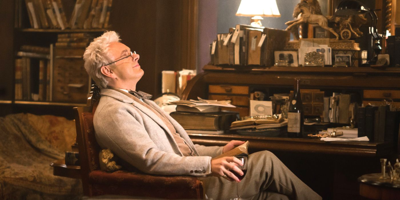 Aziraphale relaxes in his bookshop in Good Omens Season 1.