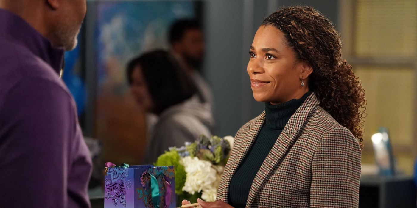 Grey's Anatomy's Dr. Maggie Pierce (Kelly McCreary) in a suit smiling