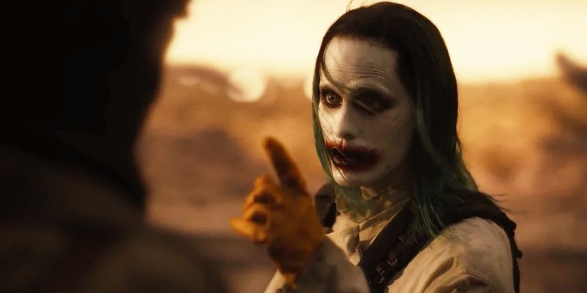 The Joker (Jared Leto) points at a barely in-frame Batman (Ben Affleck) in Zack Snyder's Justice League