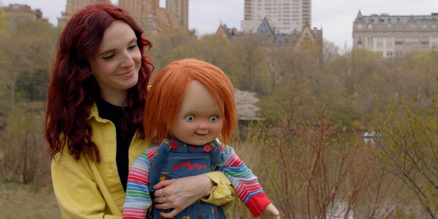 Kyra Elise Gardner holds onto Chucky in Living With Chucky