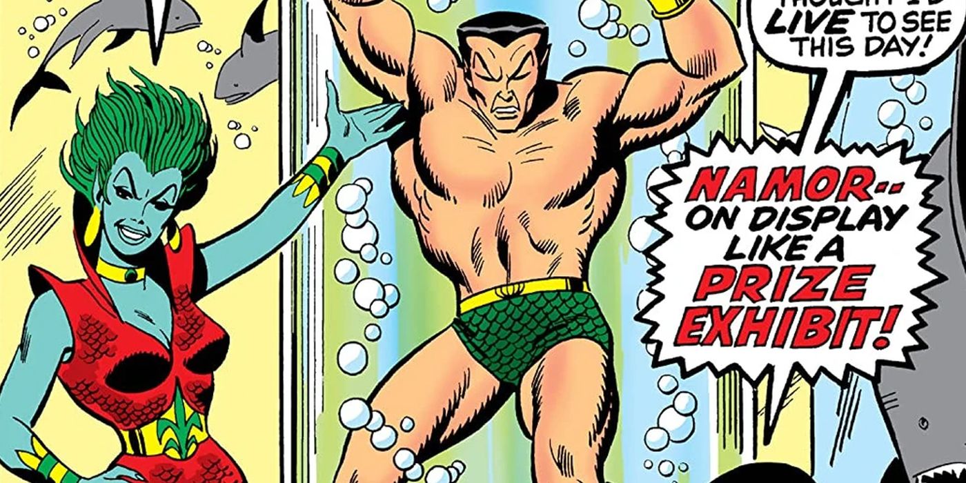 Llyra standing next to Namor on display in a glass cage filled with water from Marvel Comics