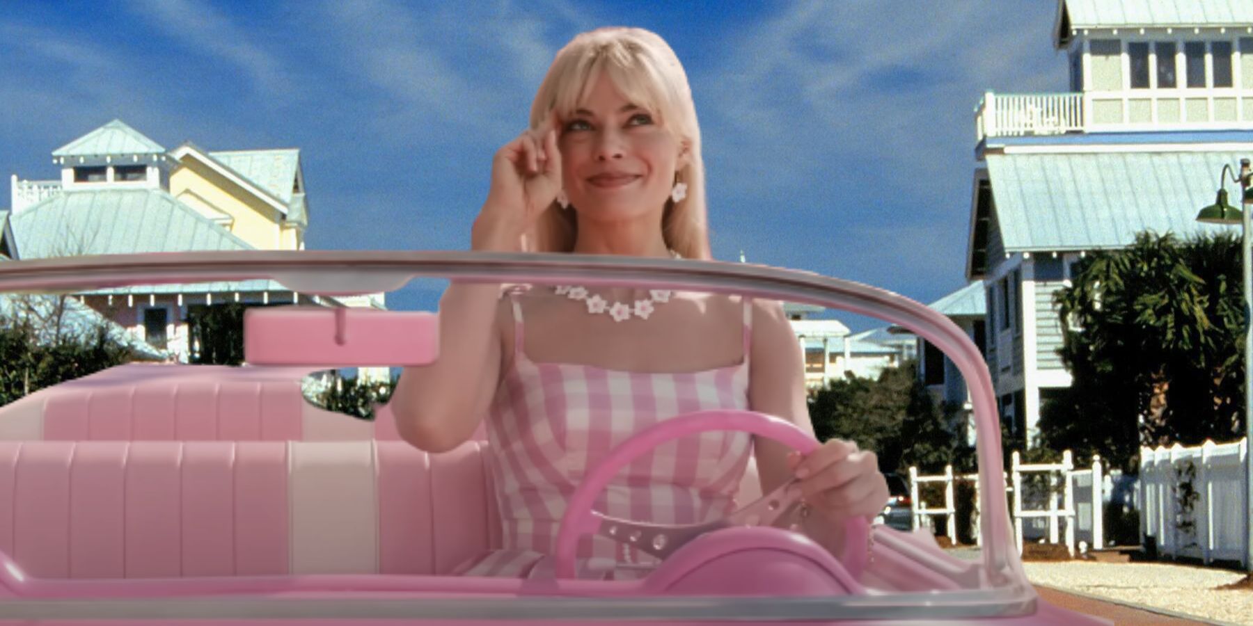 Margot Robbie's Barbie drives through The Truman Show's Seahaven