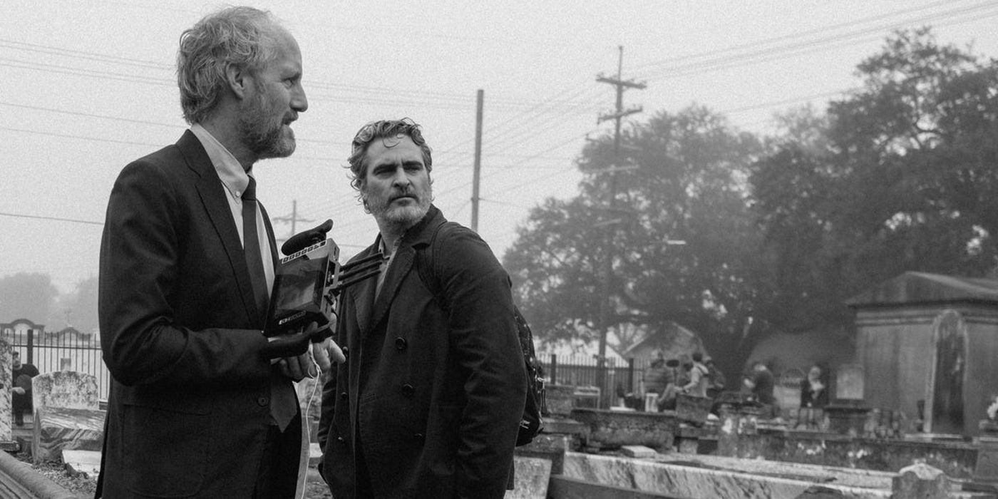 Mike Mills and Joaquin Phoenix stand together while making C'mon C'mon