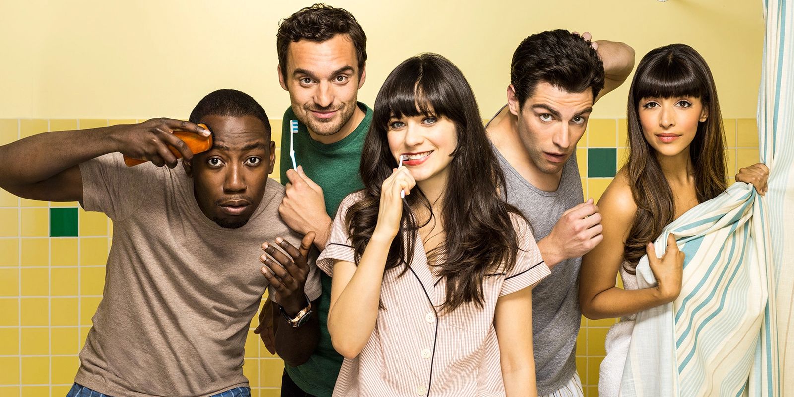 The New Girl cast posing in a bathroom