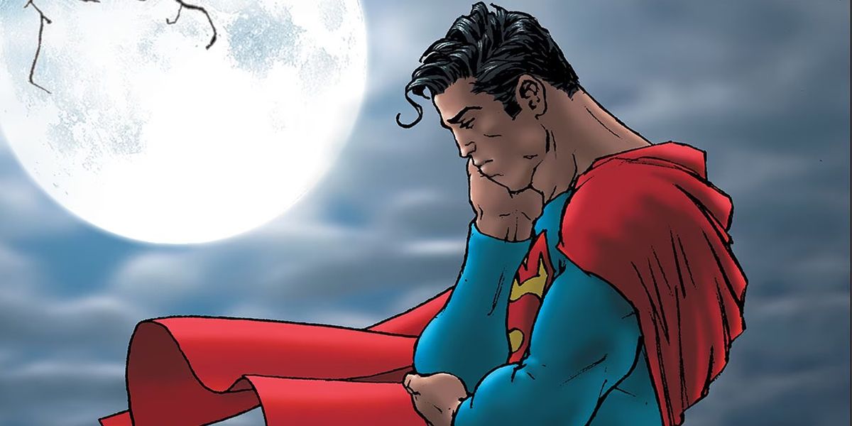 Superman from the comics with head in hand looking sad