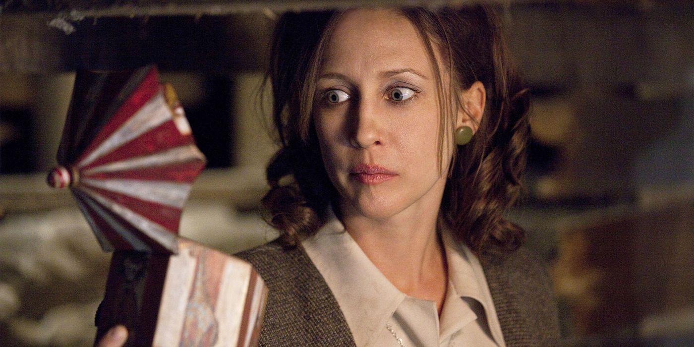 vera farmiga looking shocked by a toy in the conjuring